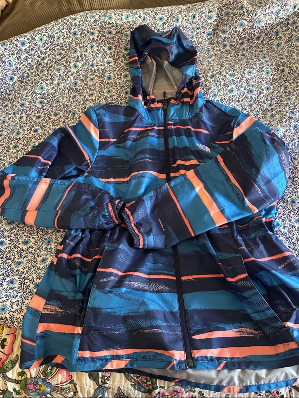 The North Face women’s ' Navy, Teal & Coral Striped Hooded Rain Jacket size xl